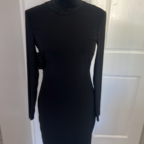 ⭐️SOLD⭐️ Bebe s black dress w/built-in bra,sheer sleeves, and open back. - Picture 2 of 8